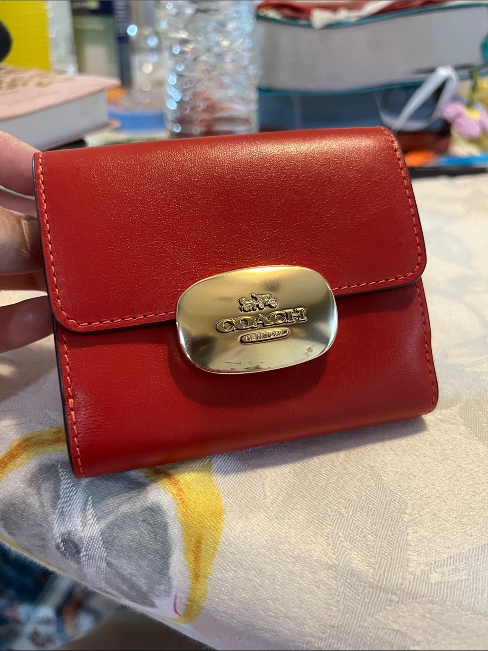 Coach Red Leather Compact Wallet with Gold Plaque